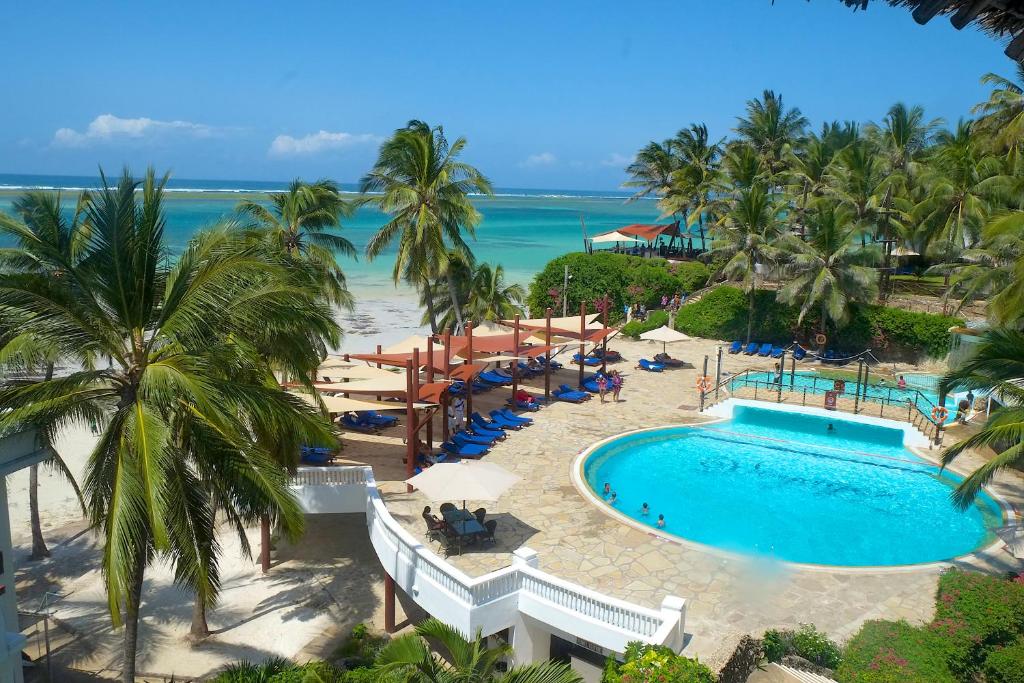 an aerial view of the beach and pool at the resort at Voyager Beach Resort in Mombasa