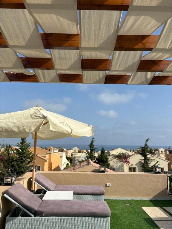 A balcony or terrace at Fancy sea view villa with private jacuzzi mountain view north coast Bait Karim - Twin Villa with roof & juccuzi
