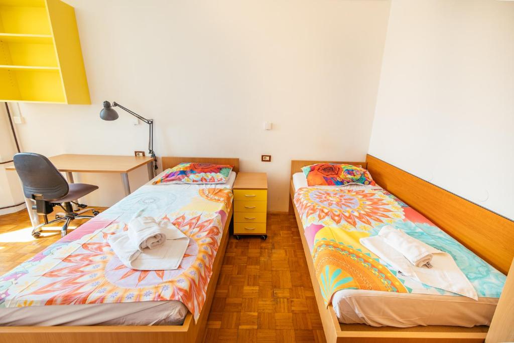 Postel nebo postele na pokoji v ubytování Prenočišča Prisoje