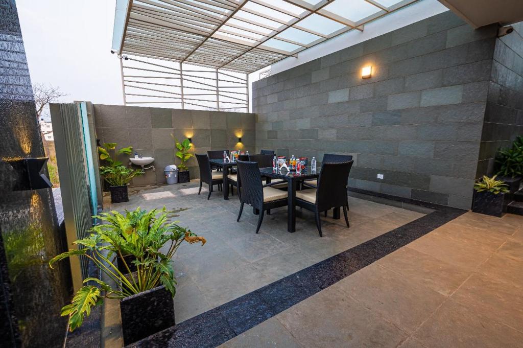 Posezení v ubytování S R Pool Suites