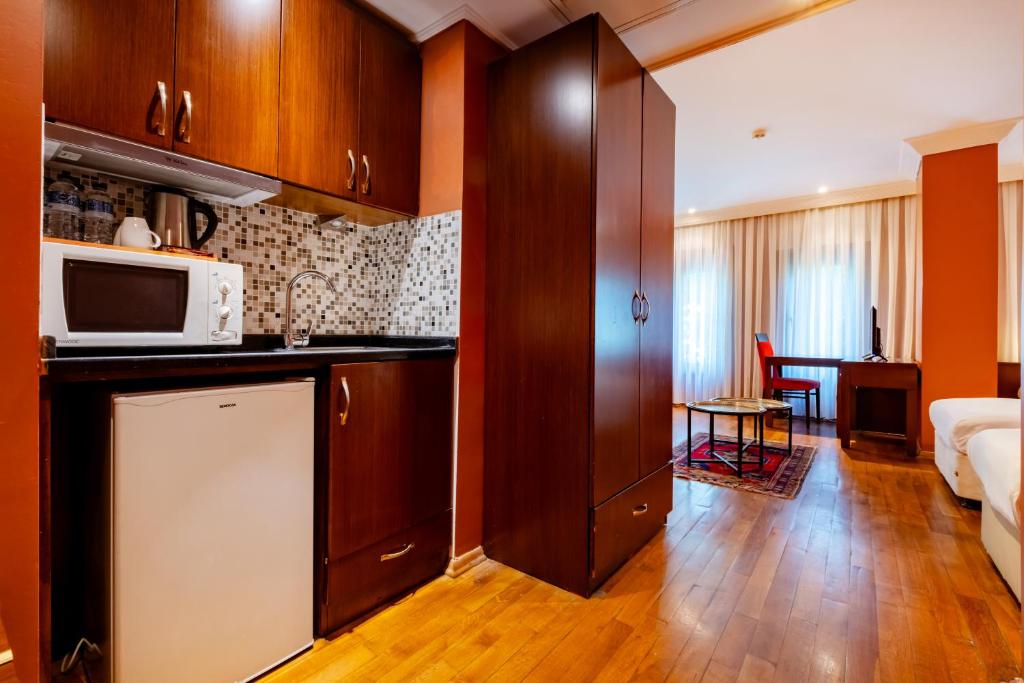 A kitchen or kitchenette at Mangana Konak Hotel