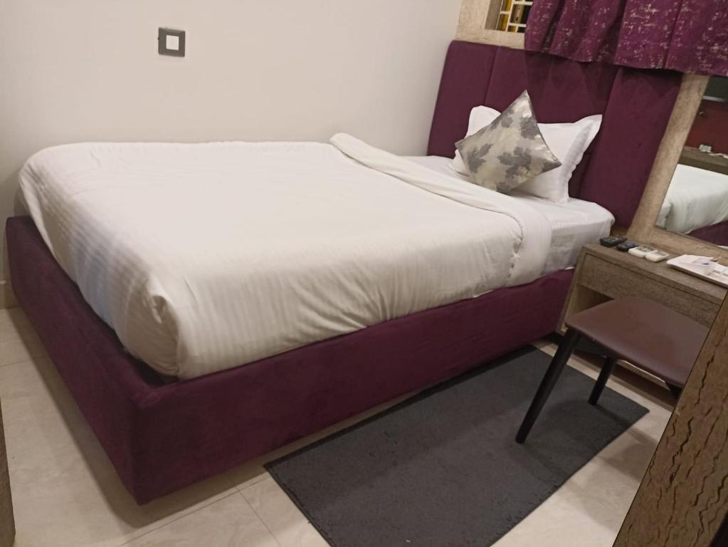 Postel nebo postele na pokoji v ubytování karisma premium