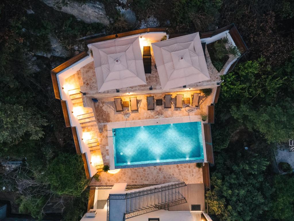 an aerial view of a house with a swimming pool at CASA BIANCA & Spa 2 in Ulcinj