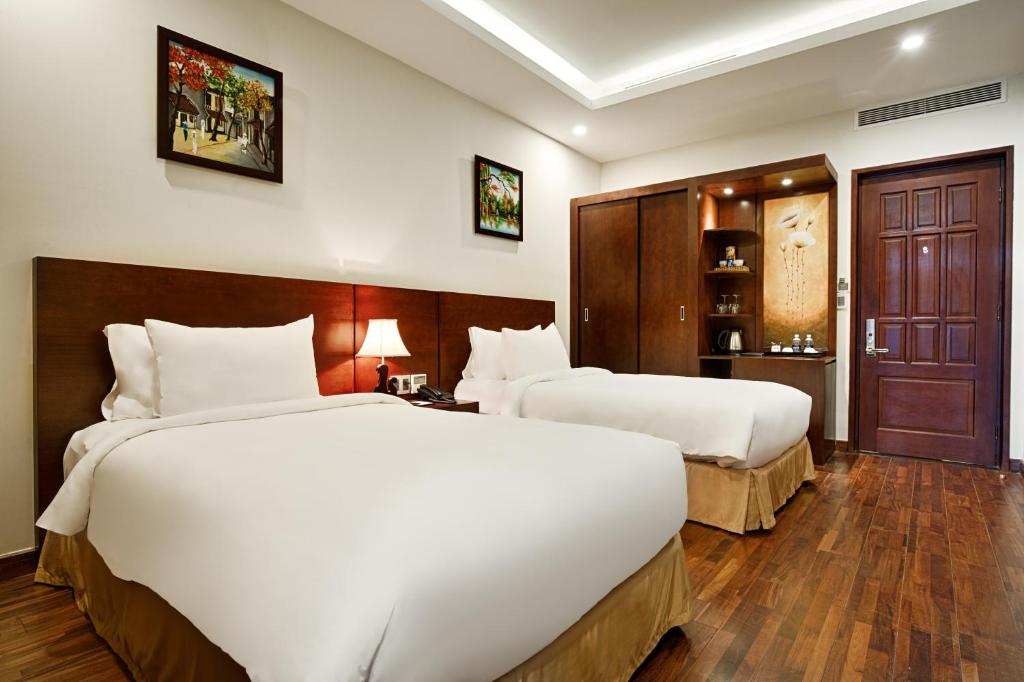 Postel nebo postele na pokoji v ubytování Ebisu Onsen Resort