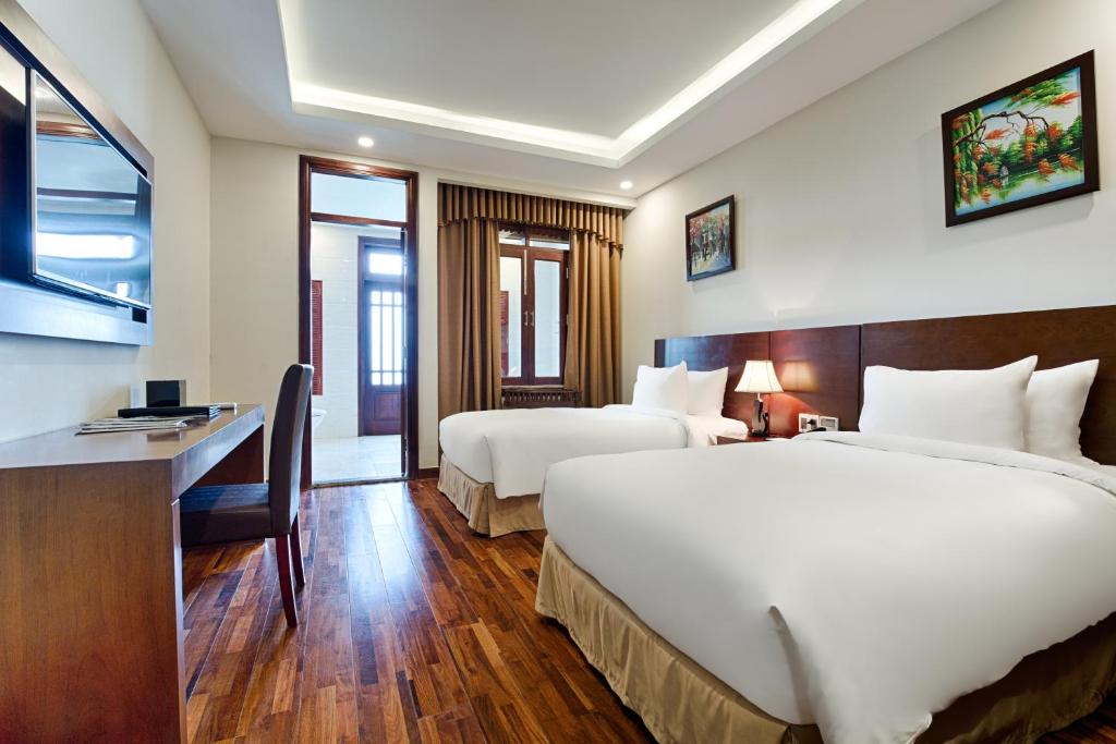 Postel nebo postele na pokoji v ubytování Ebisu Onsen Resort