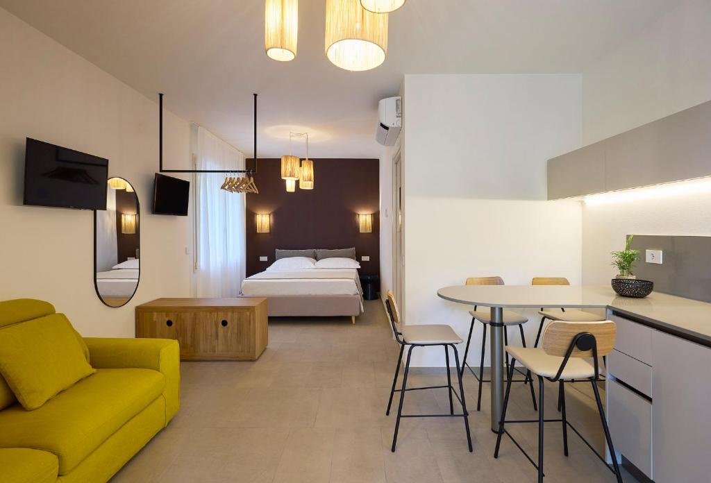 Ένα ή περισσότερα κρεβάτια σε δωμάτιο στο La Sfiora - Appartamenti