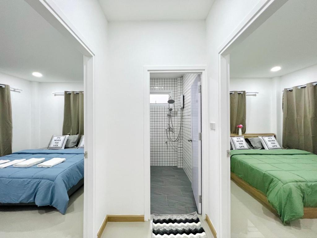 Katil atau katil-katil dalam bilik di เวมบ์โฮม Vem Home