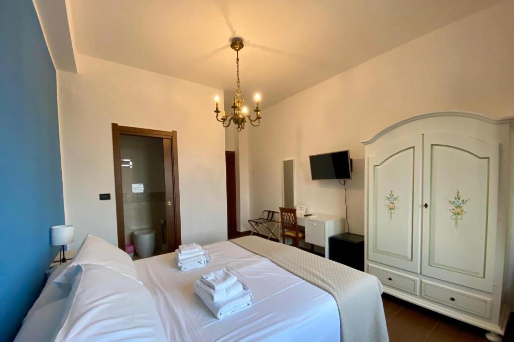 Postel nebo postele na pokoji v ubytování Panoramic Rooms