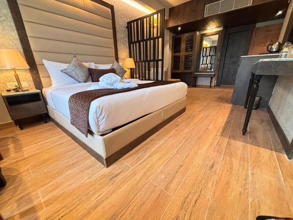 Postel nebo postele na pokoji v ubytování Northin Hotel