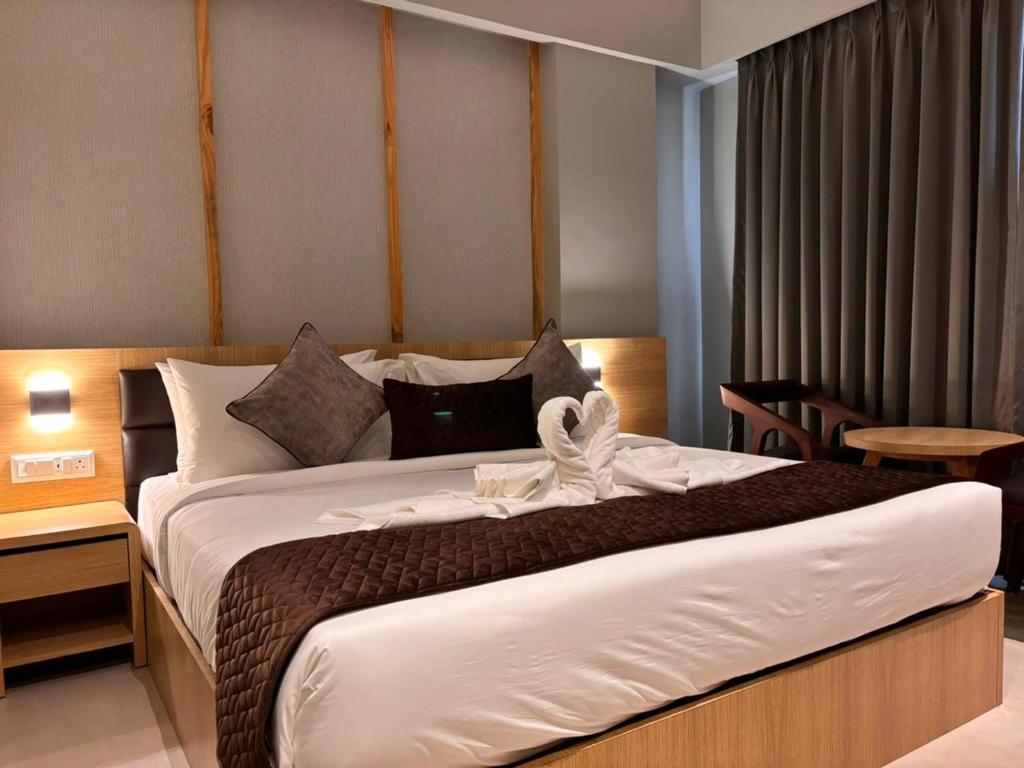 Postel nebo postele na pokoji v ubytování Northin Hotel