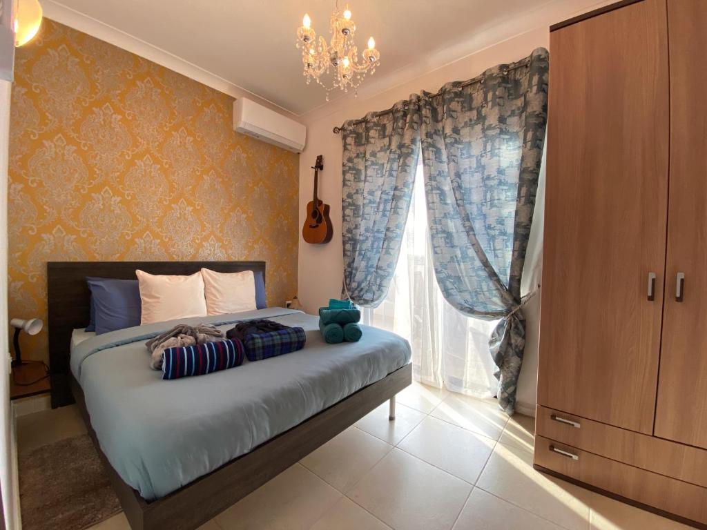 Postel nebo postele na pokoji v ubytování KIMRAY Boutique Apartment - Indulge in Comfort, Embrace Tranquility