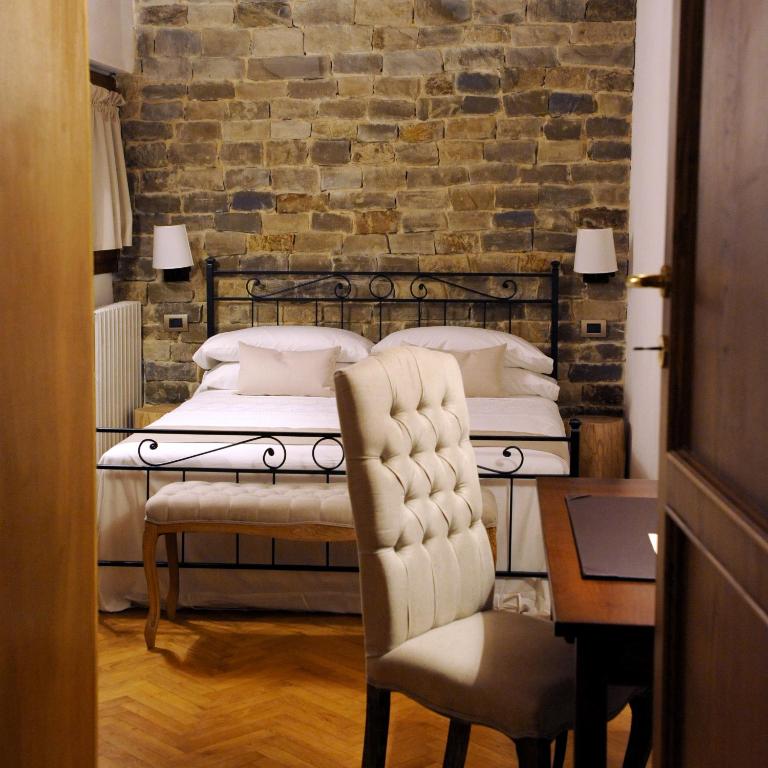 A seating area at ARIA DI CASA APARTMENT