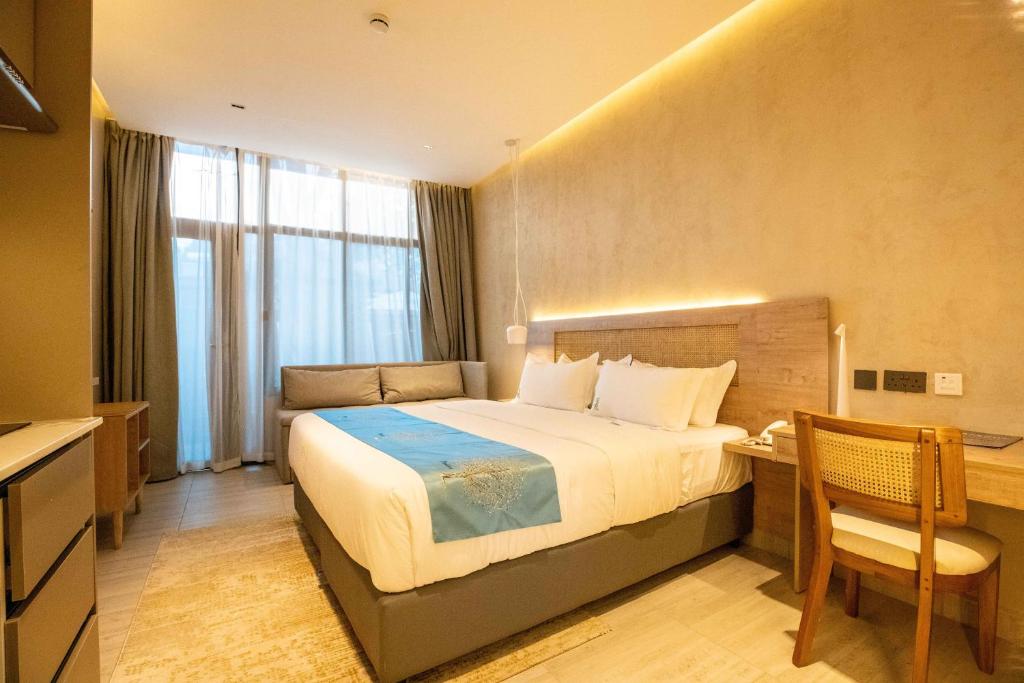 Postel nebo postele na pokoji v ubytování Gigiri Lion Villas II
