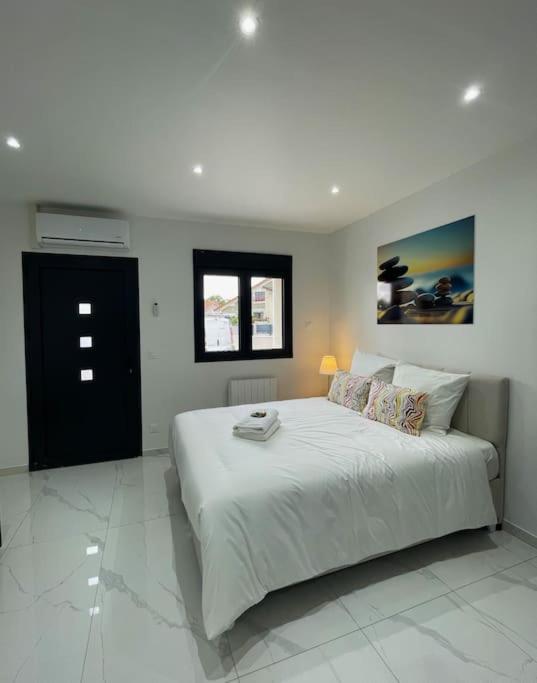 Katil atau katil-katil dalam bilik di Moderne Studio proche ORLY- Paris