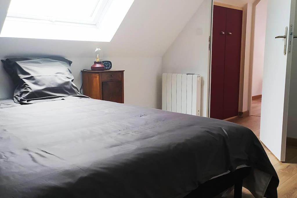 Postel nebo postele na pokoji v ubytování Le gîte de la Ferme