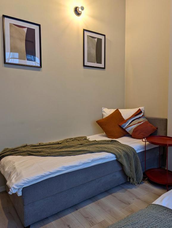 Voodi või voodid majutusasutuse RYNEK 30 Hostel toas