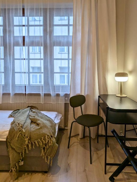 Voodi või voodid majutusasutuse RYNEK 30 Hostel toas