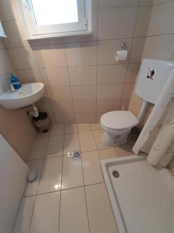 Koupelna v ubytování Iliada
