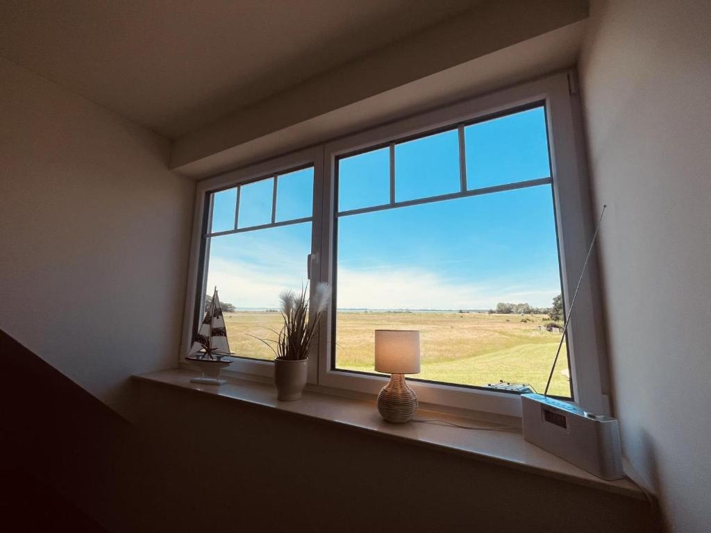 Fotografie z fotogalerie ubytování Holmblick - Boddenblick, Balkon, 2 Schlafzimmer, 4 Personen v destinaci Born