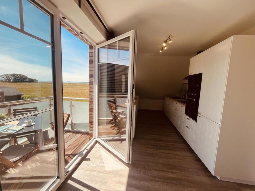 Balkón nebo terasa v ubytování Holmblick - Boddenblick, Balkon, 2 Schlafzimmer, 4 Personen