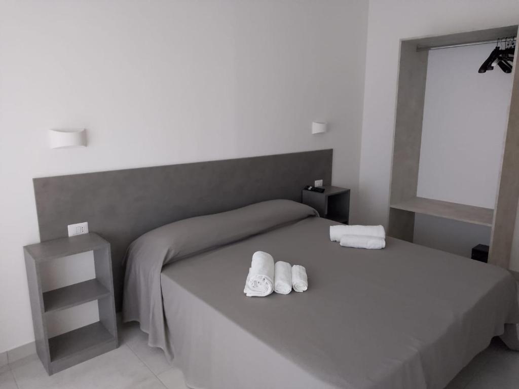 Postel nebo postele na pokoji v ubytování Villa3 Cancelli Guesthouse B&B via del Mare Formia