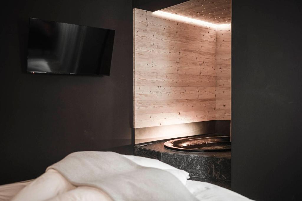TV a/nebo společenská místnost v ubytování Chalet Yak Häusl - Sauna & Whirlpool