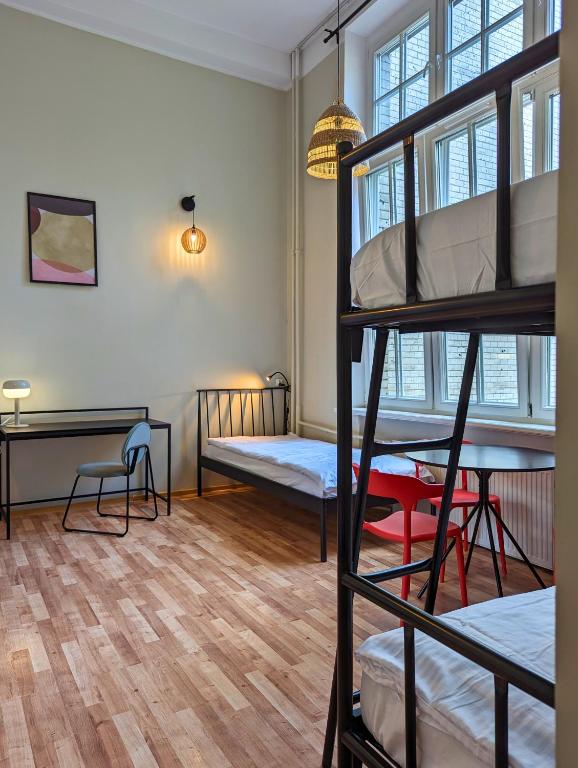Voodi või voodid majutusasutuse RYNEK 30 Hostel toas