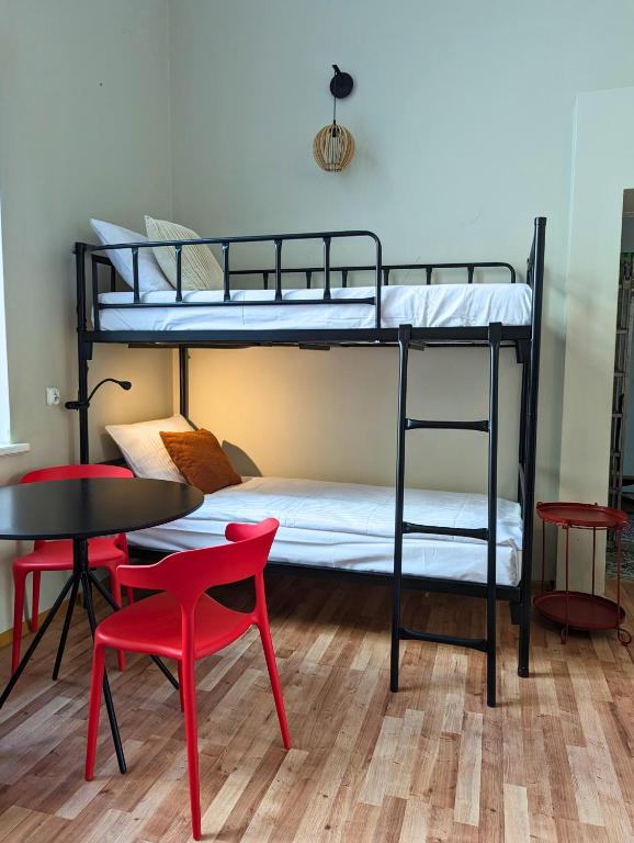 Voodi või voodid majutusasutuse RYNEK 30 Hostel toas