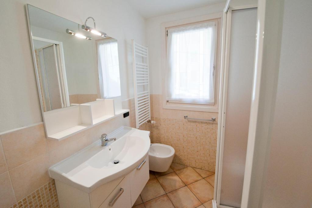 Koupelna v ubytování Residence La Corte