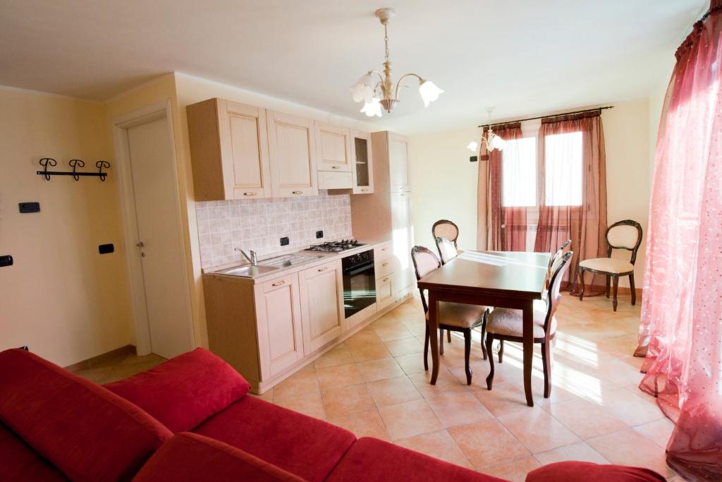 Kuchyň nebo kuchyňský kout v ubytování Residence La Corte