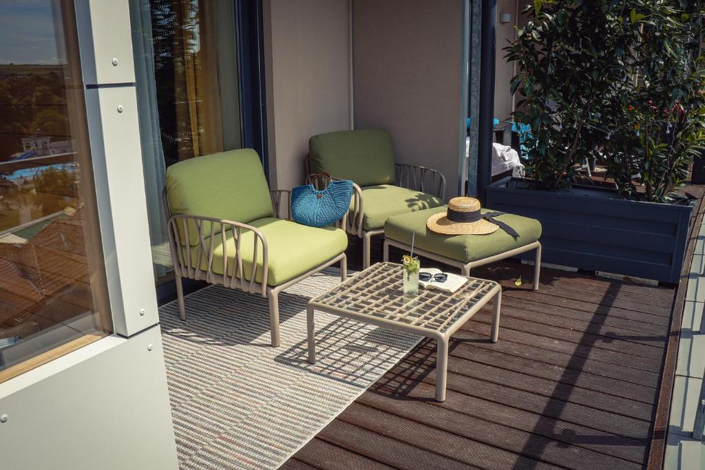 Posezení v ubytování Imola Hotel Platán
