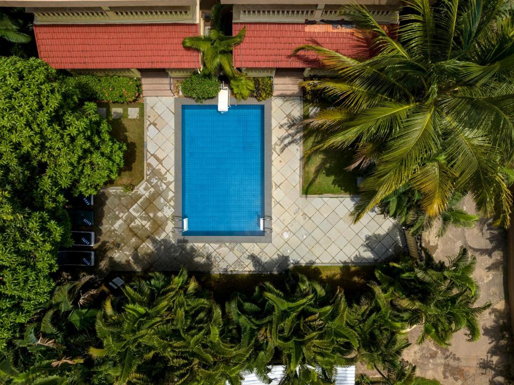 Bazén v ubytování De Mandarin Beach Resort Suites & Villas, Candolim nebo v jeho okolí