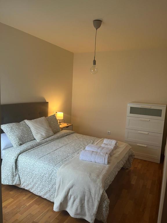 Katil atau katil-katil dalam bilik di Apartamento Nordés