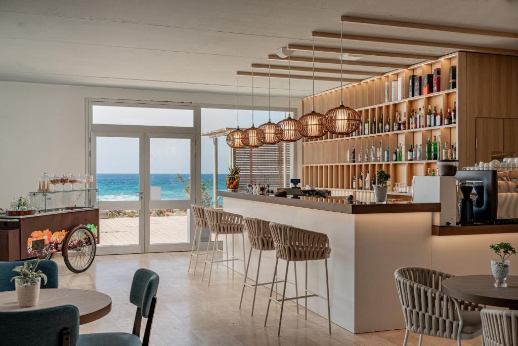 Nápoje v ubytování Bellevue Sardinia Resort Affiliated by Meliá