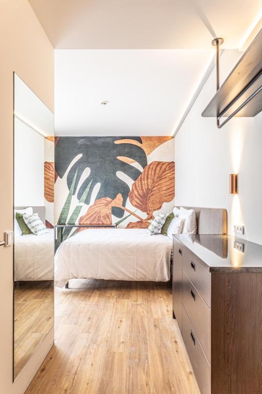 Postel nebo postele na pokoji v ubytování Hotel DAS SAAL