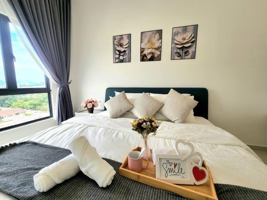 Postel nebo postele na pokoji v ubytování IPOH City Horizon08 - 8 mins to Concubine Lane and Old Town Ipoh, 3 mins Walking to Food Places & Convenient Store by Happy Homestay