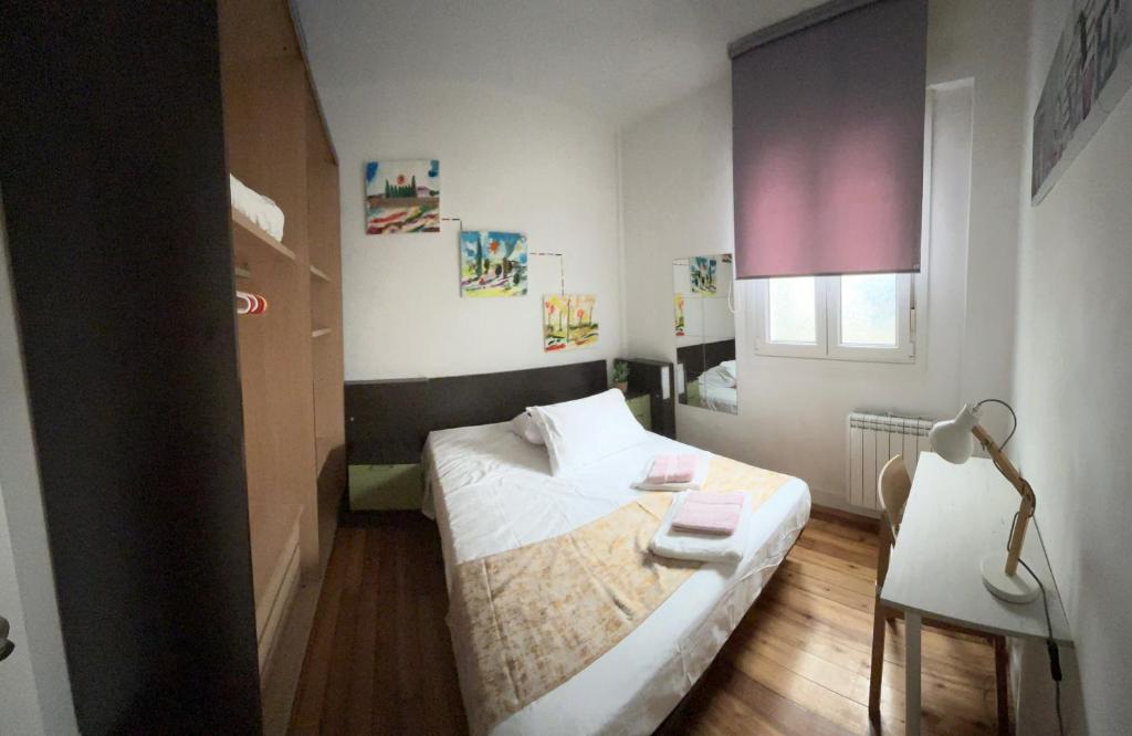 Postel nebo postele na pokoji v ubytování Casa Narolai