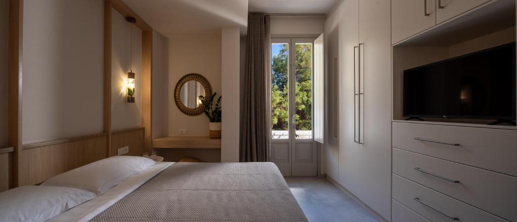 Postel nebo postele na pokoji v ubytování Nerea Seaside Villa