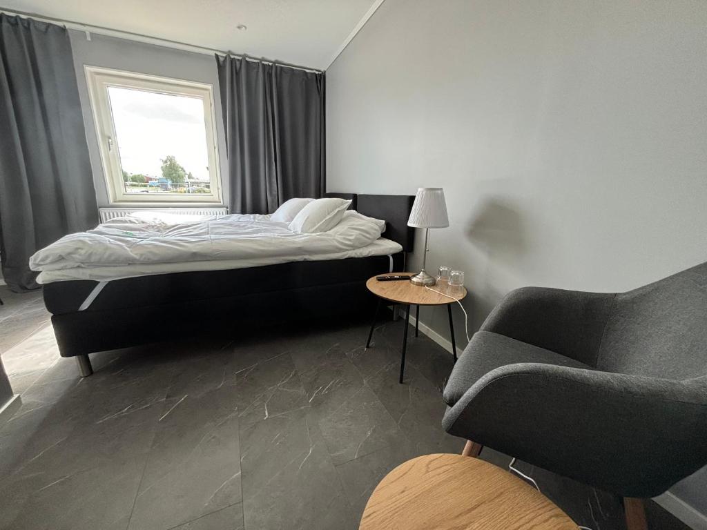 Postel nebo postele na pokoji v ubytování Hotel Lapland River