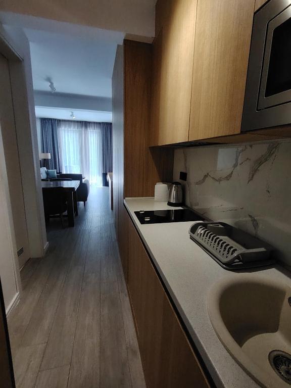 Kuchyň nebo kuchyňský kout v ubytování Dubrave apartmani