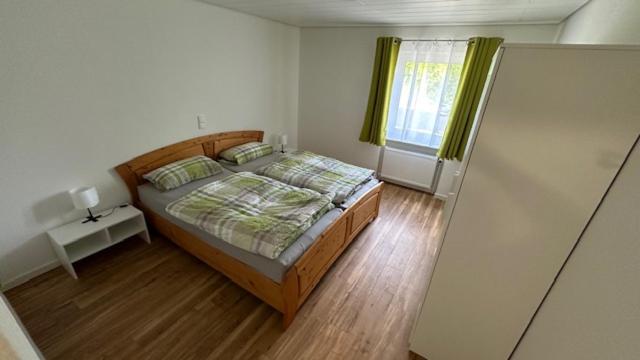 Postel nebo postele na pokoji v ubytování Weiherblick