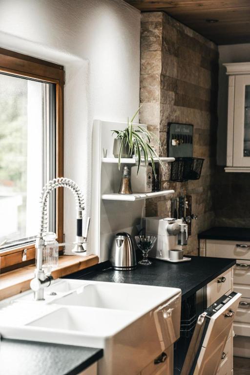 A kitchen or kitchenette at ChaletSerlesblickTIROL