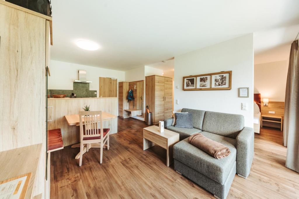 Posezení v ubytování Regitnig - 4 Sterne Hotel und Chalets