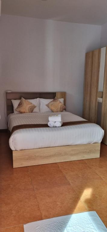 Postel nebo postele na pokoji v ubytování Meyers Hua Hin