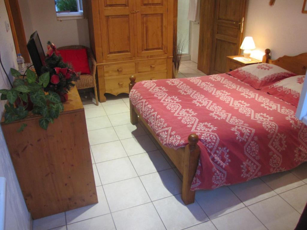 Postel nebo postele na pokoji v ubytování Maison d'Hôtes Douce Nuit