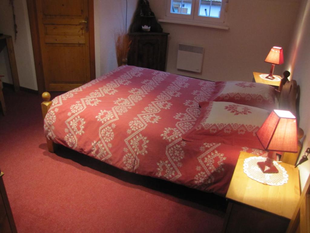 Postel nebo postele na pokoji v ubytování Maison d'Hôtes Douce Nuit