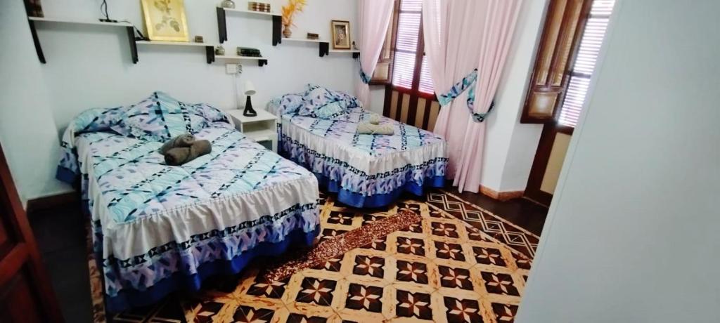 Postel nebo postele na pokoji v ubytování Velez Nazari Casa Molina