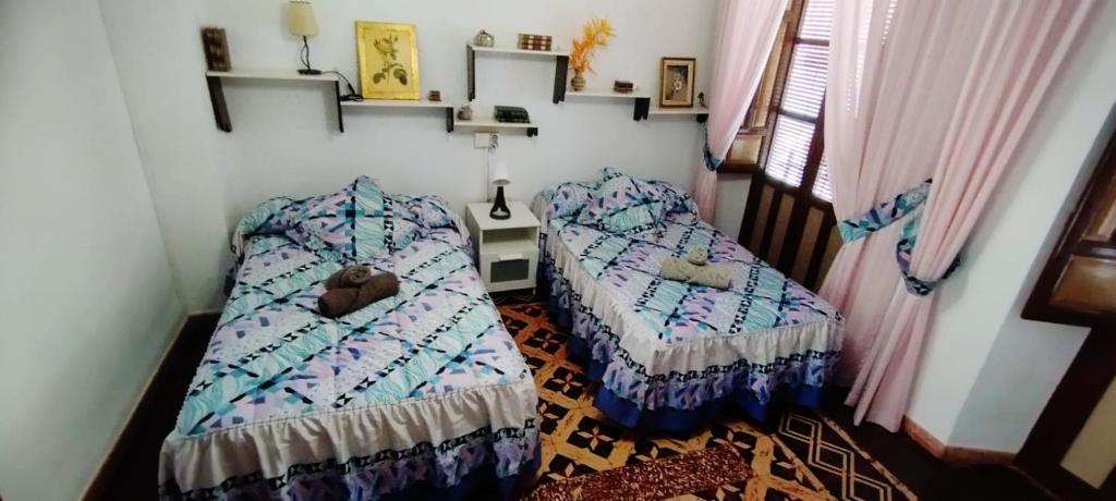 Postel nebo postele na pokoji v ubytování Velez Nazari Casa Molina