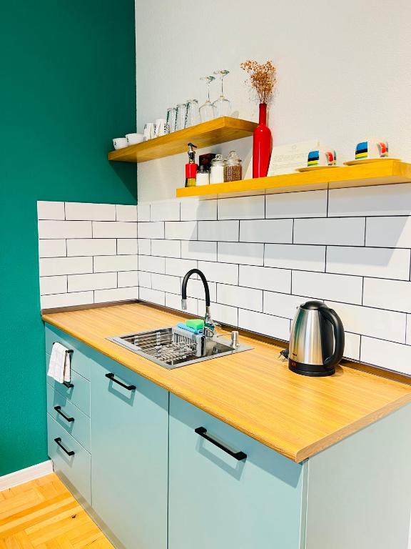 Cucina o angolo cottura di Pirosmani Boutique Aparthotel