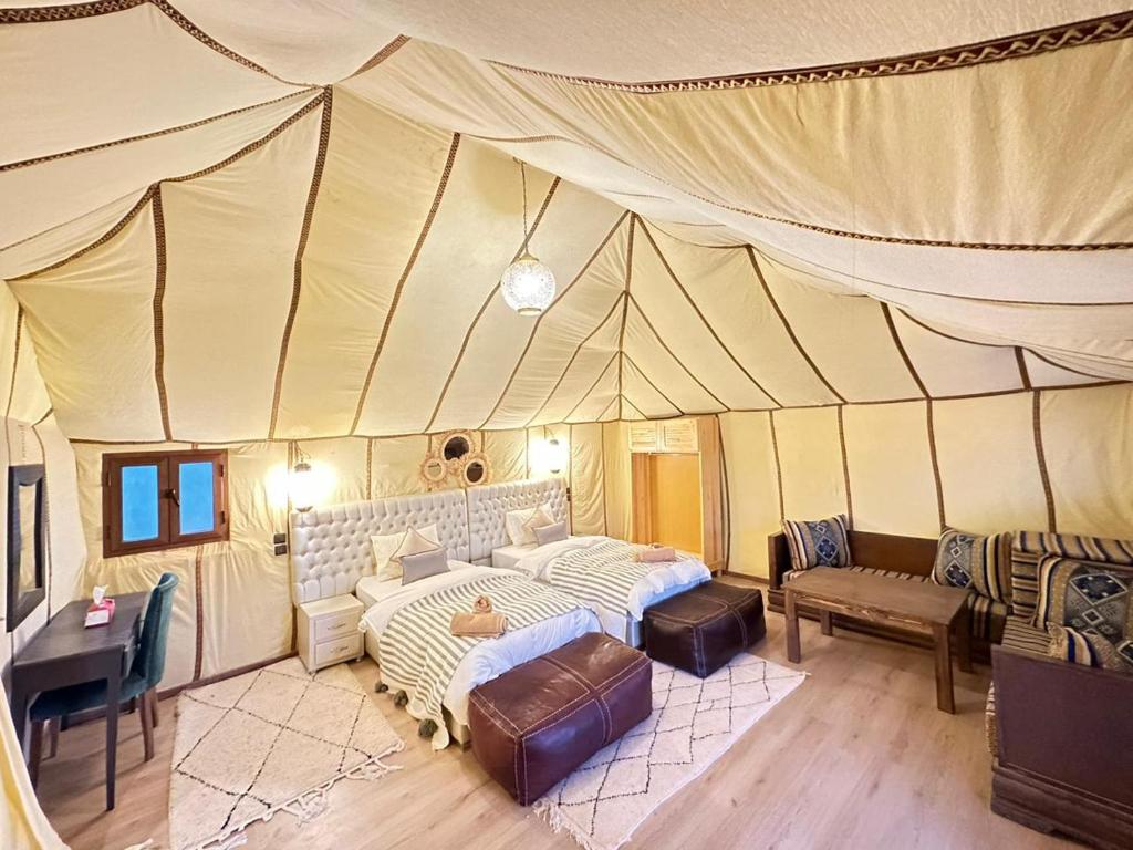 Postel nebo postele na pokoji v ubytování Nomads Dunes Nest
